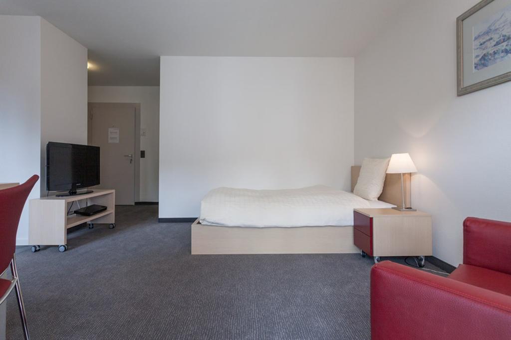 Ema House Serviced Apartments Seefeld Цюрих Номер фото